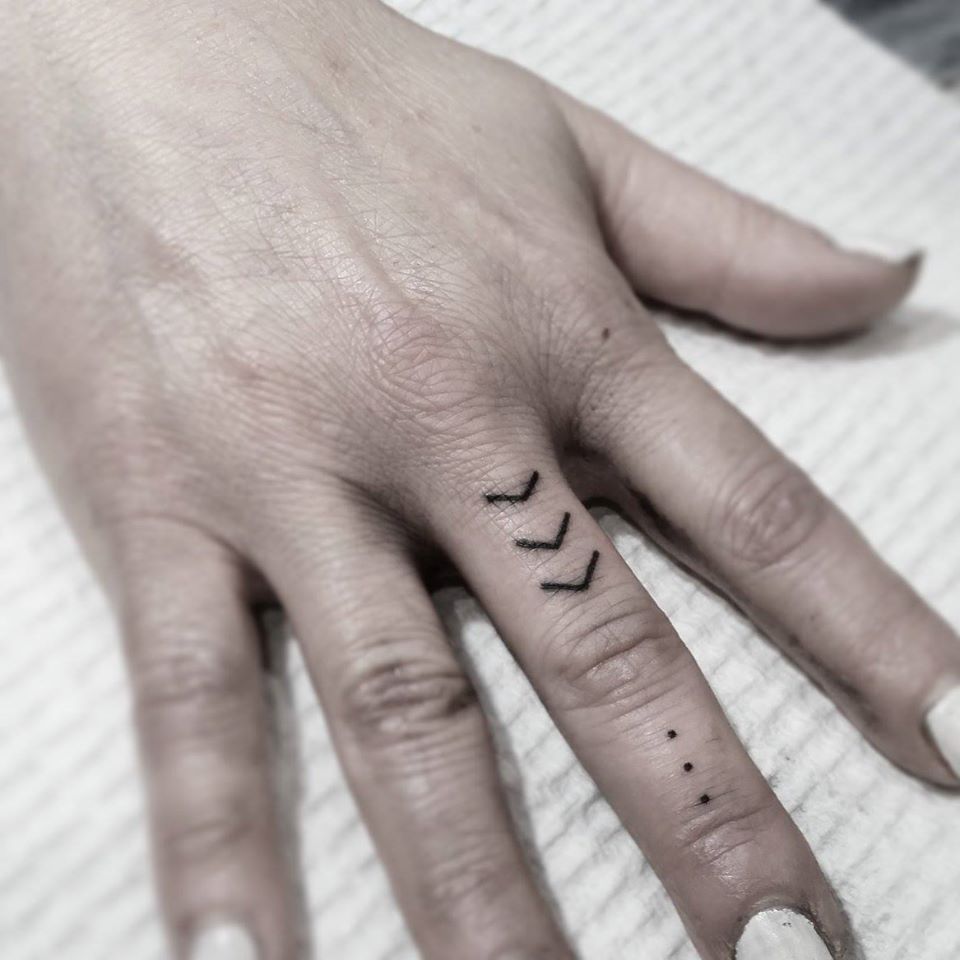 small arrow tattoo