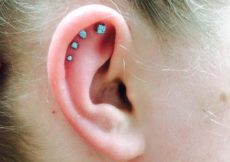 Fashionable stone stud piercing design