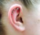 Fashionable stone stud piercing design